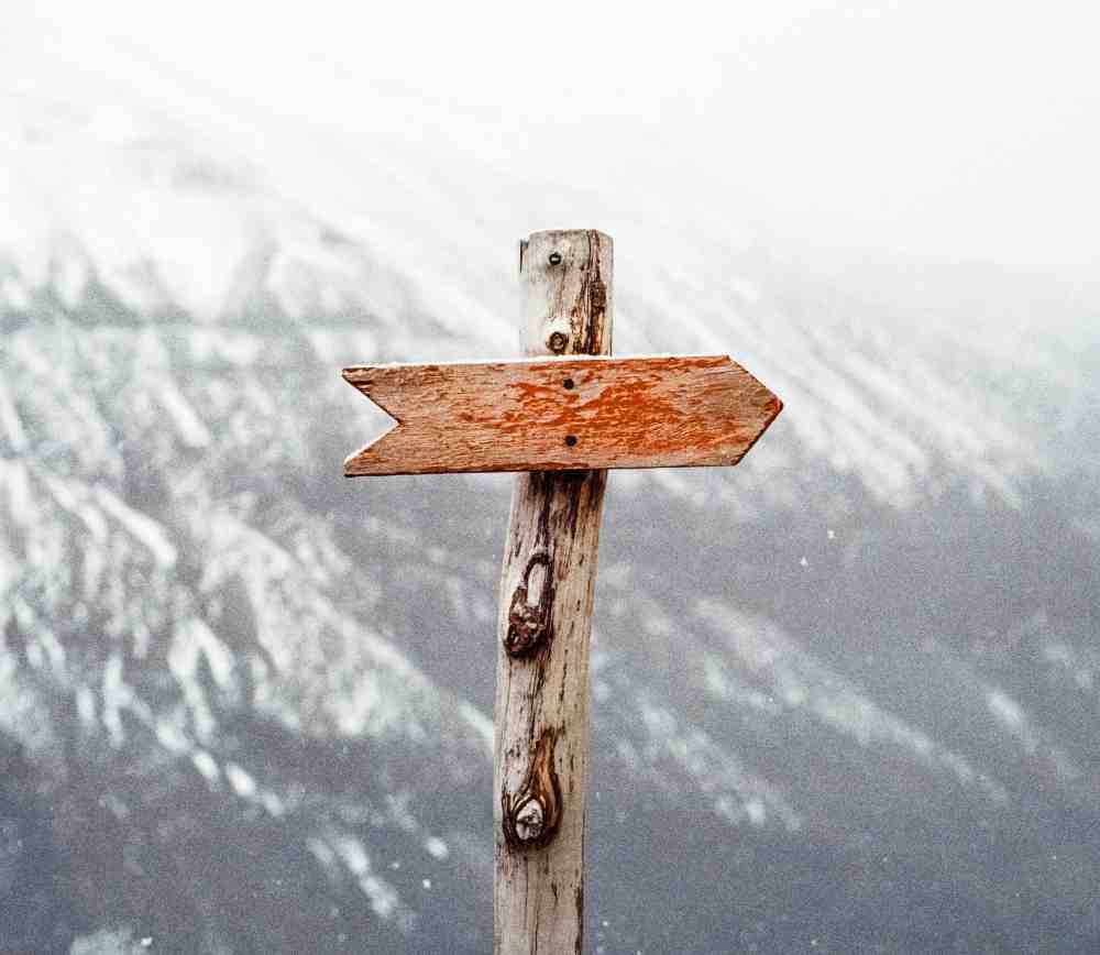 an image of a wooden arrow pointing right