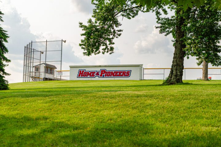 Home of the Pioneers dugout campus shot